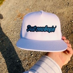 Outlaw outfitters just cowboyin’ trucker hat